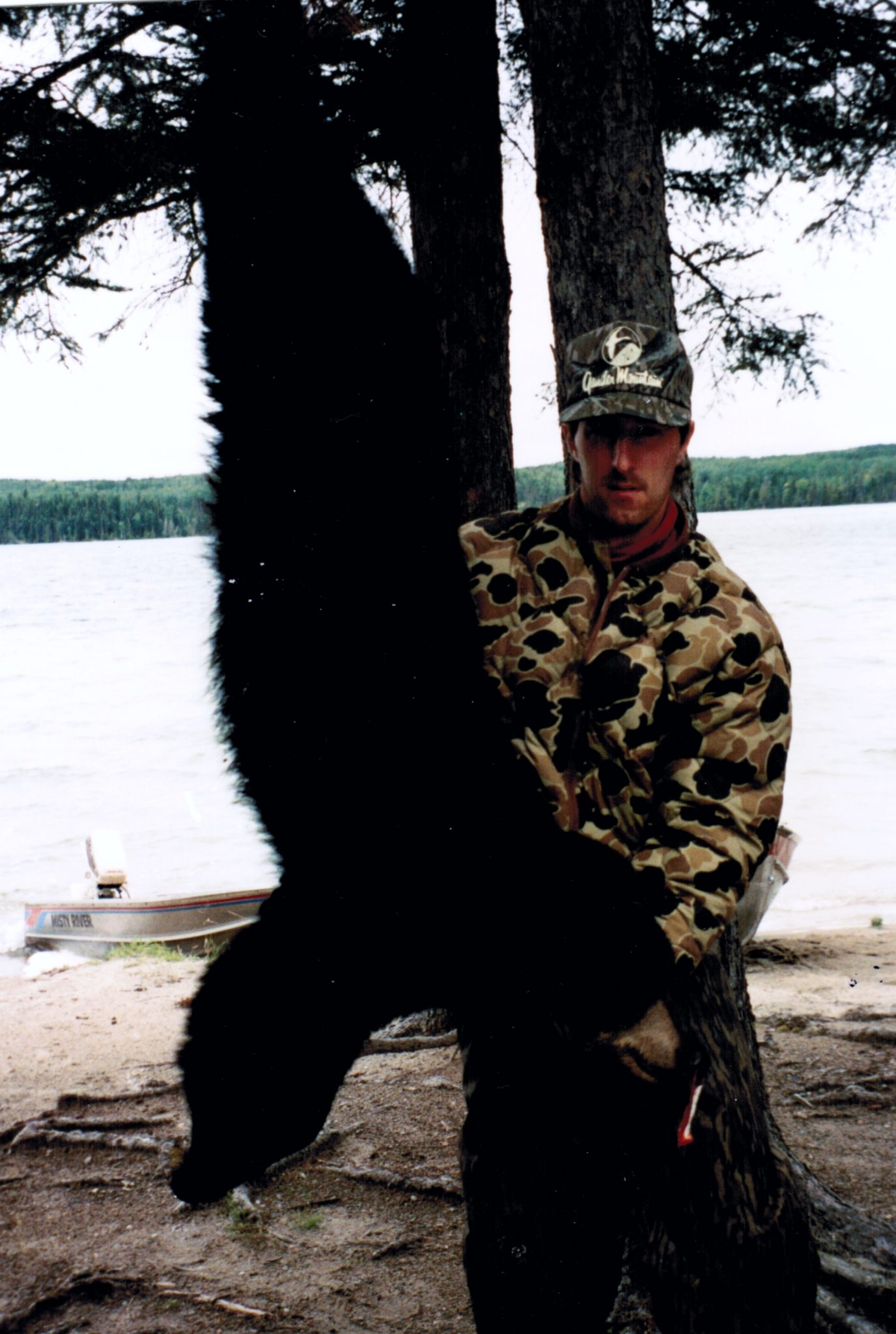 Retro picture of an early black bear hunt at Pasha Lake Cabins